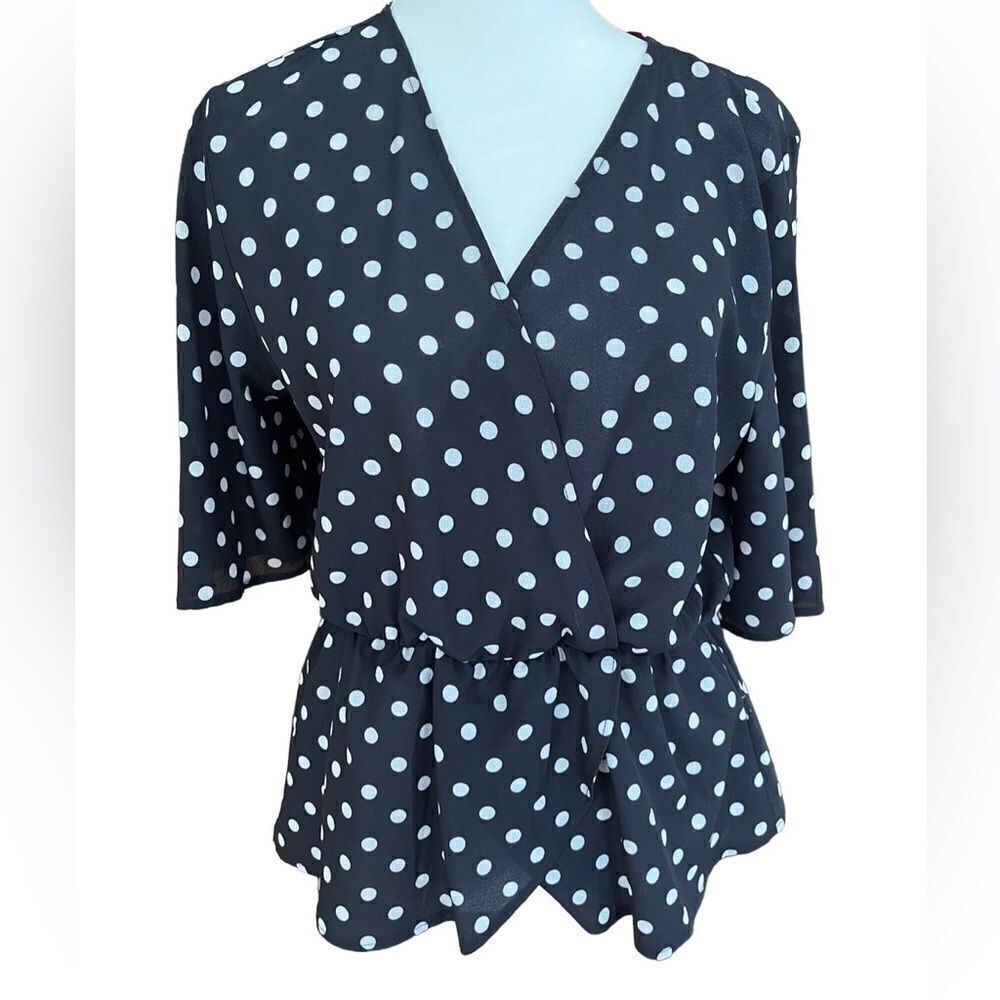 NEXT black/white polka dot peplum style top, size 10